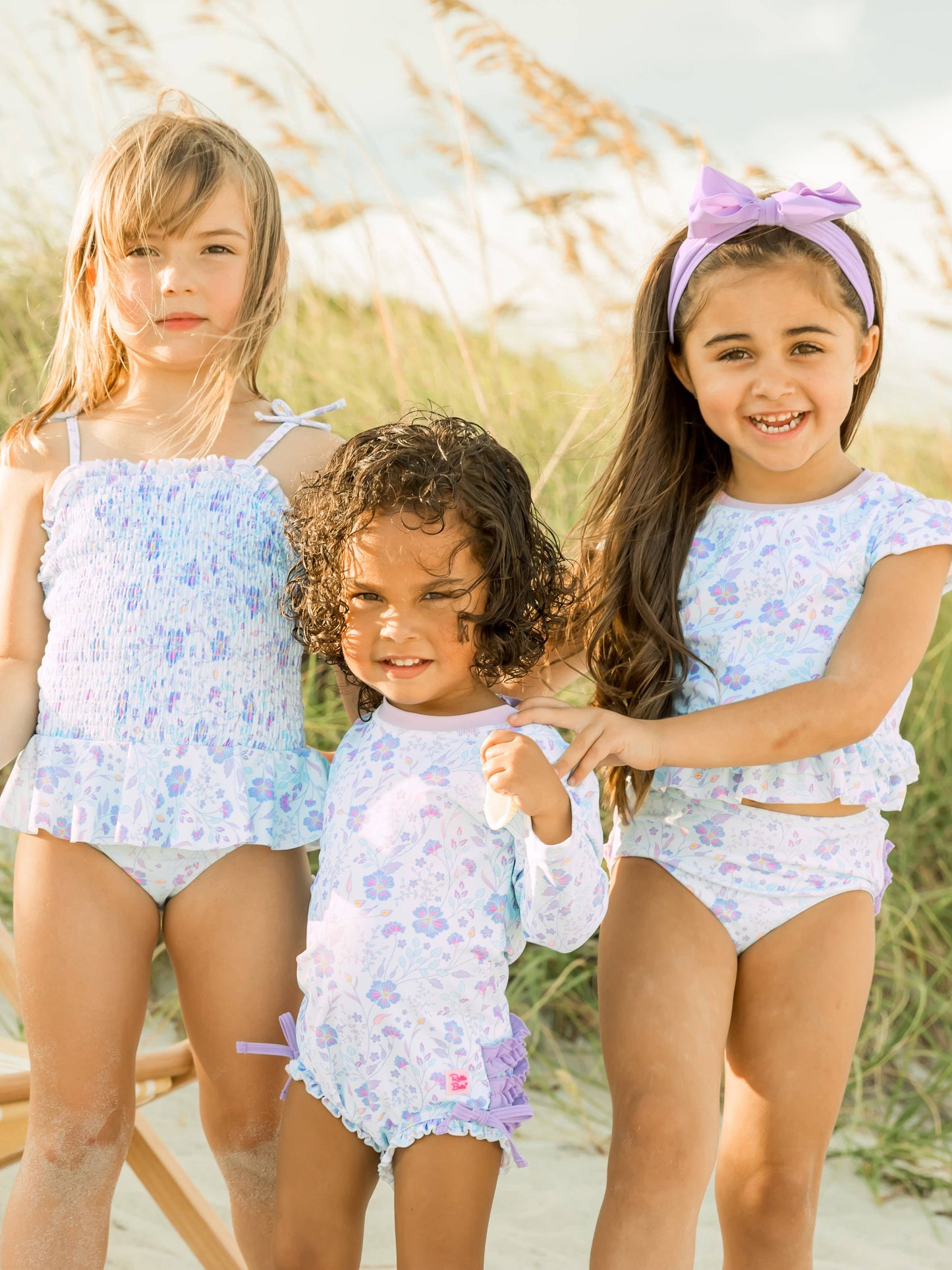 RuffleButts + RuggedButts - Baby Girls Fairytale Garden Long Sleeve One Piece Rash Guard Swimsuit with Signature Rear Ruffles