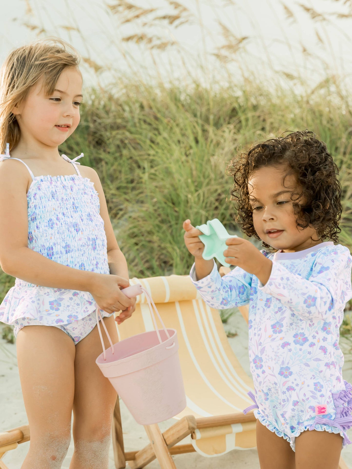 RuffleButts + RuggedButts - Baby Girls Fairytale Garden Long Sleeve One Piece Rash Guard Swimsuit with Signature Rear Ruffles