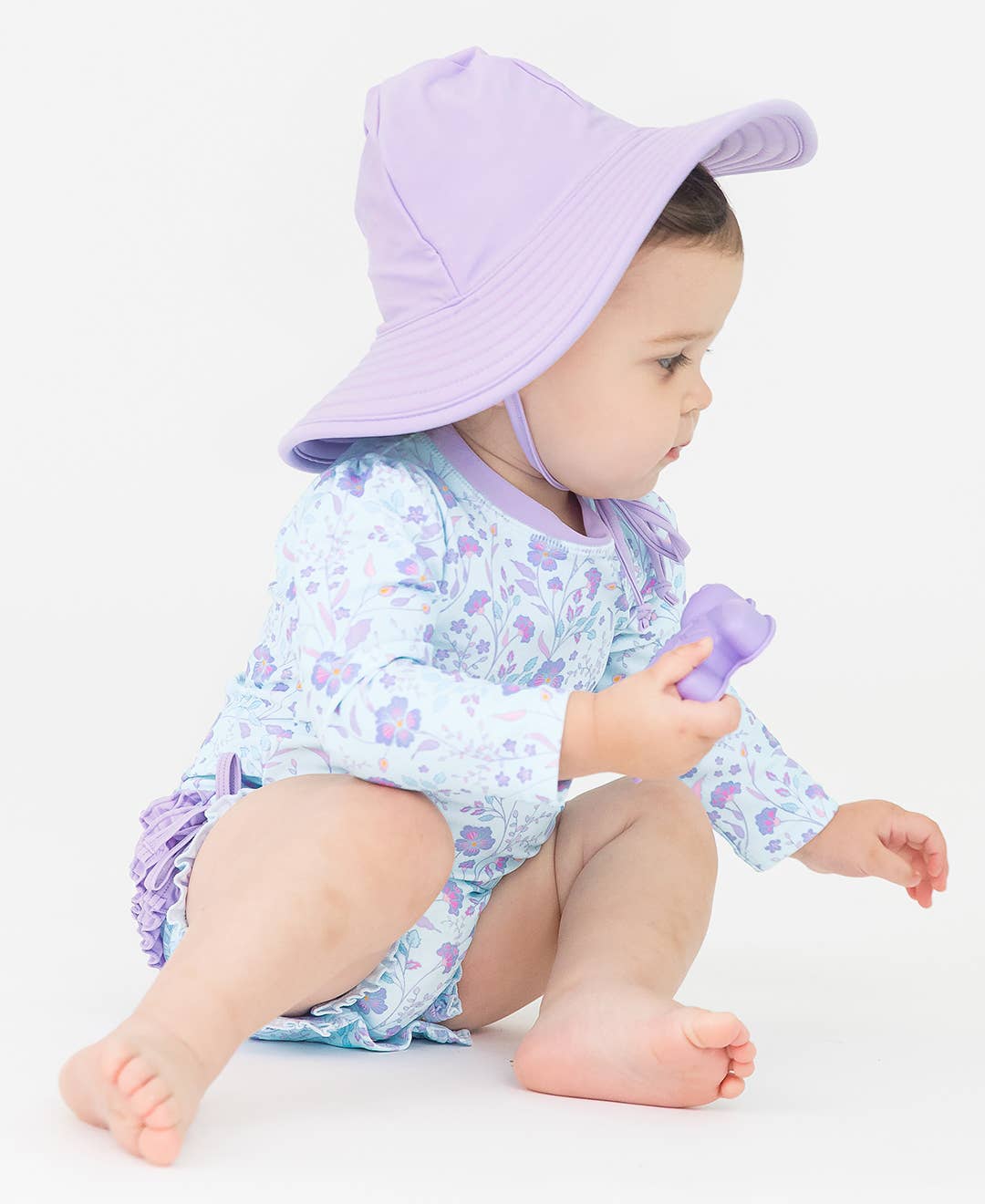 RuffleButts + RuggedButts - Baby Girls Fairytale Garden Long Sleeve One Piece Rash Guard Swimsuit with Signature Rear Ruffles