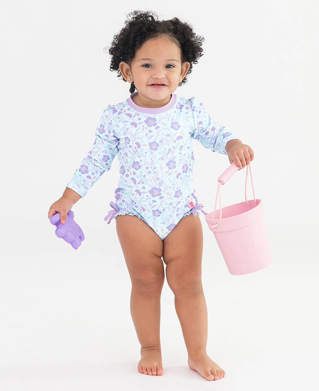 RuffleButts + RuggedButts - Baby Girls Fairytale Garden Long Sleeve One Piece Rash Guard Swimsuit with Signature Rear Ruffles