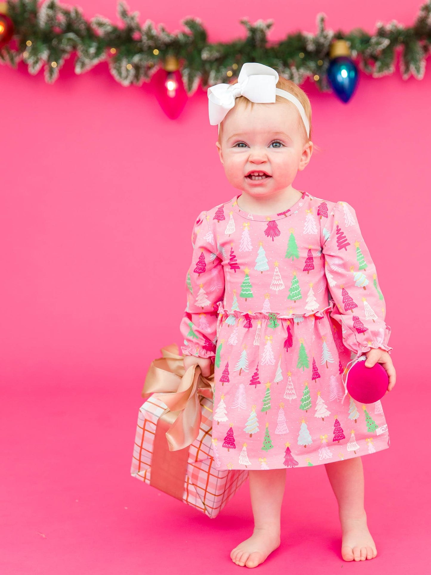 RuffleButts + RuggedButts - Baby Girls Merry Pink Pines Knit Long Sleeve Skirted Romper