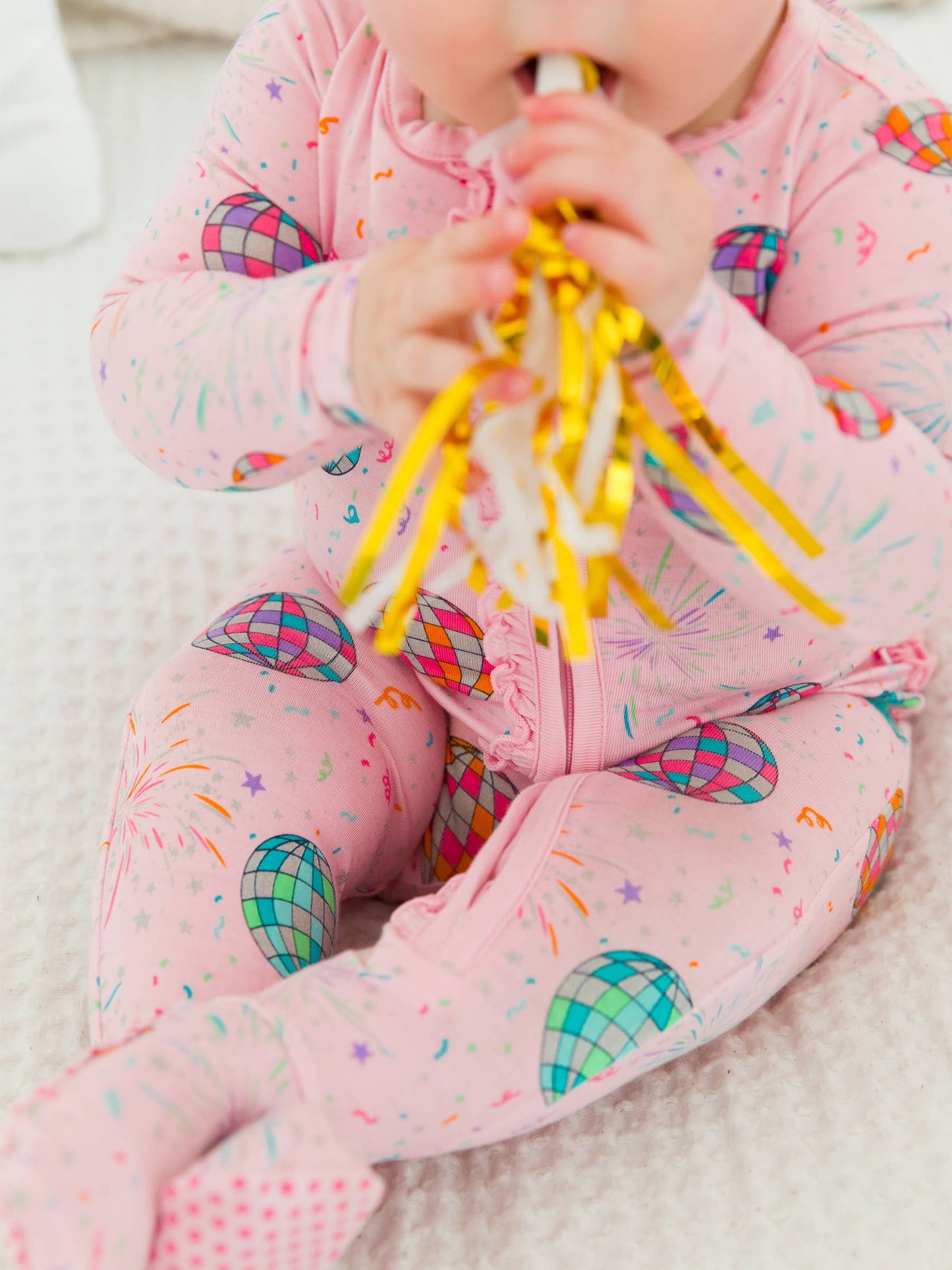 RuffleButts + RuggedButts - Baby Girls Pink Happy New Year Bamboo Viscose Footed Ruffle One Piece Pajama