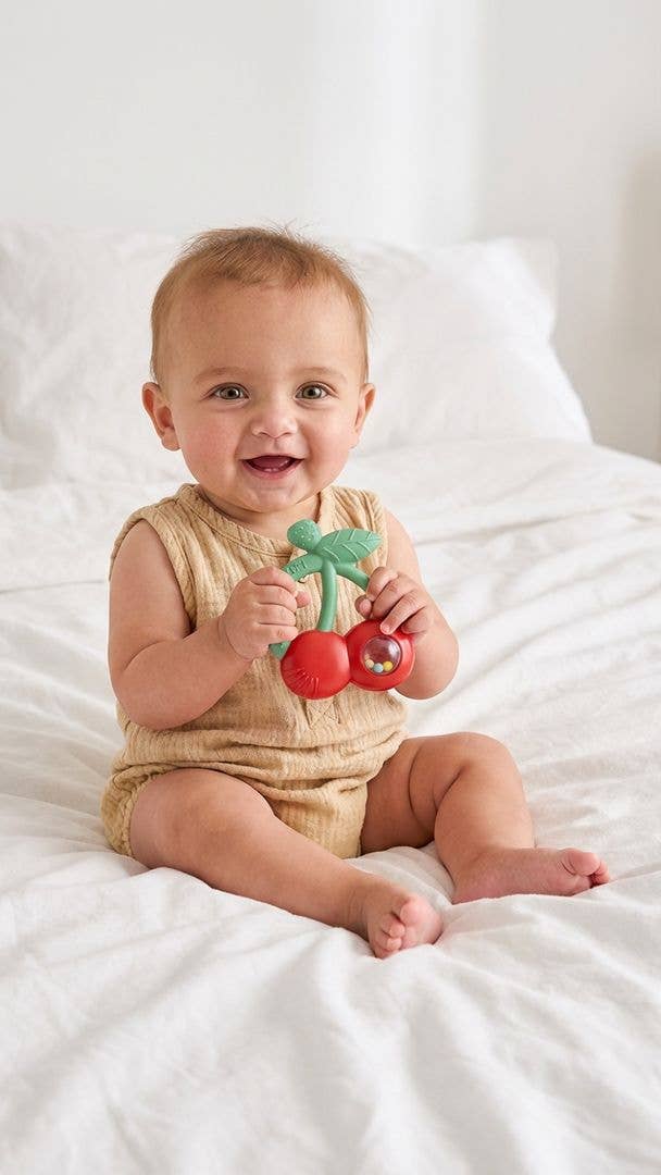 Itzy Ritzy - "NEW" Bitzy Shake™ - Silicone Teether with Rattle