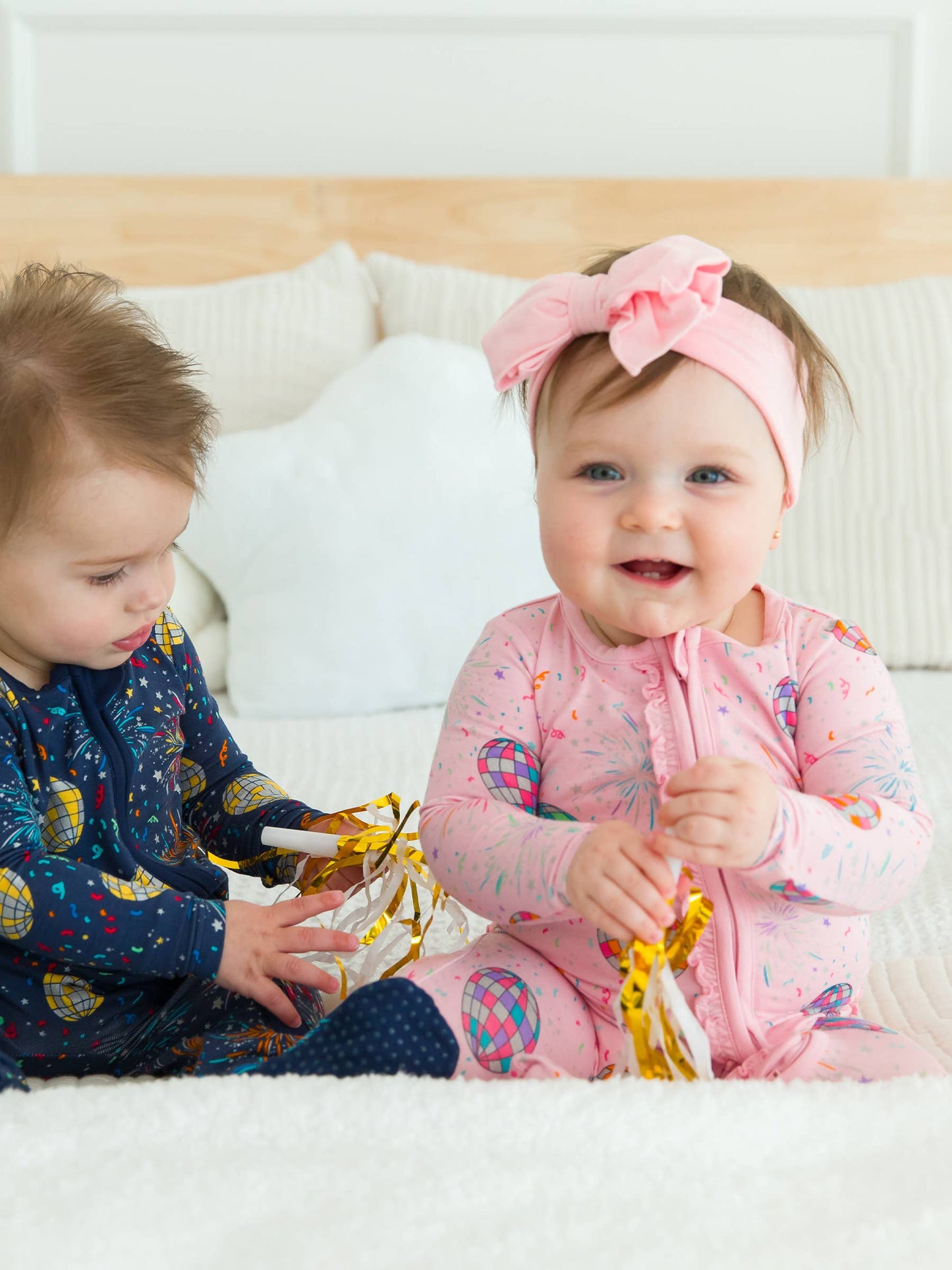 RuffleButts + RuggedButts - Baby Girls Pink Happy New Year Bamboo Viscose Footed Ruffle One Piece Pajama