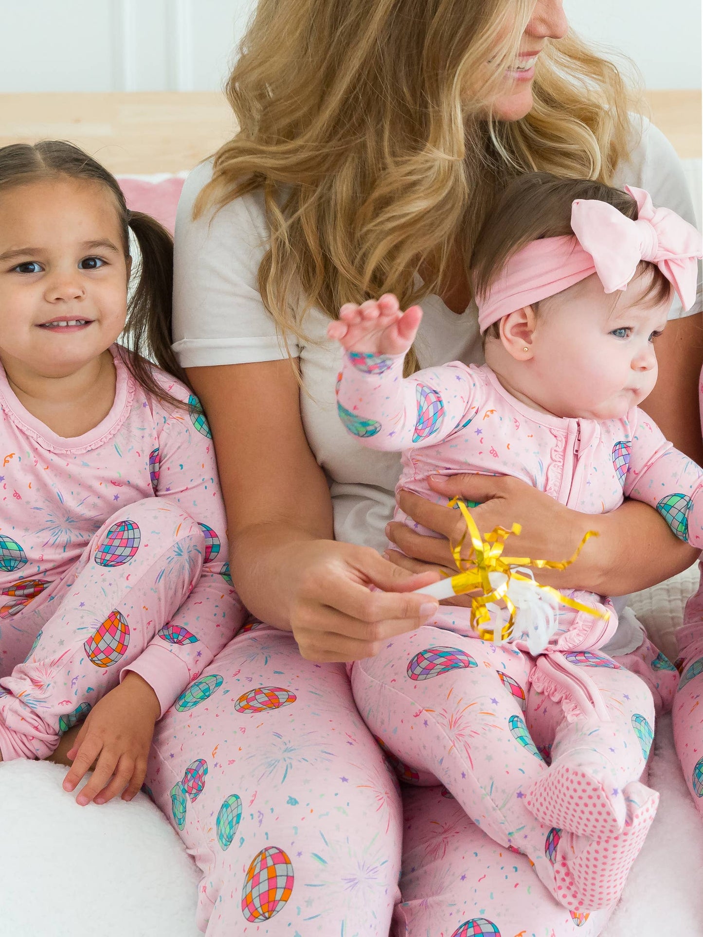 RuffleButts + RuggedButts - Baby Girls Pink Happy New Year Bamboo Viscose Footed Ruffle One Piece Pajama